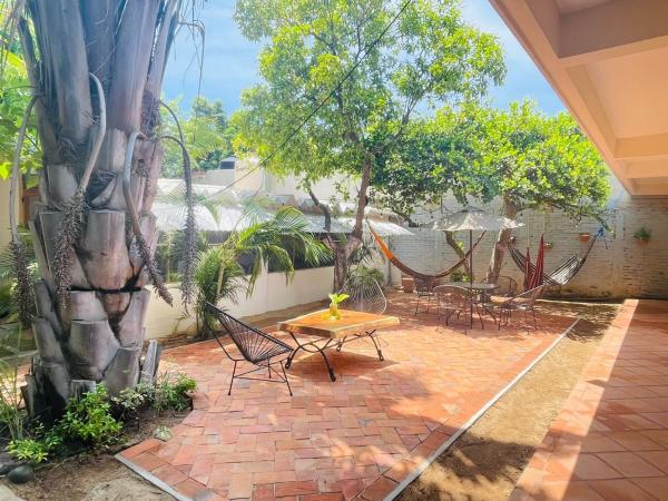 Casa Sixta a 7min del aeropuerto internacional PMX y 2 cuadras terminal autob ADO, 予約 ゲストハウス プエルト・エスコンディドのゲストハウス, ゲストハウス